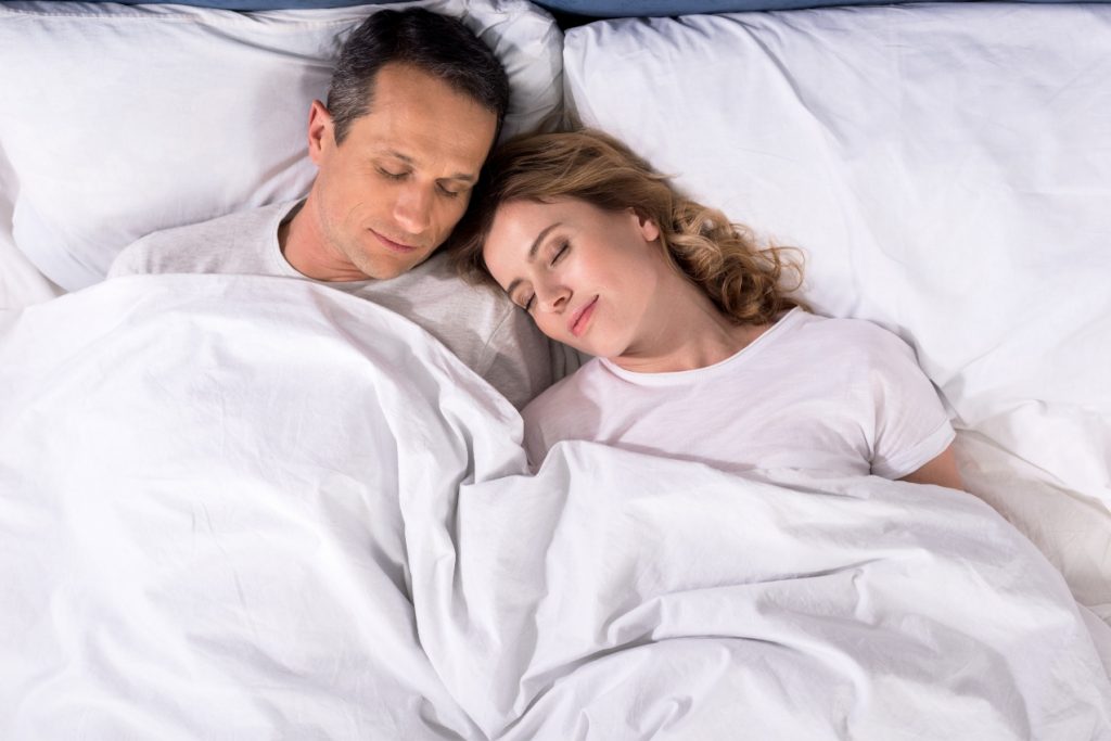 peaceful couple asleep