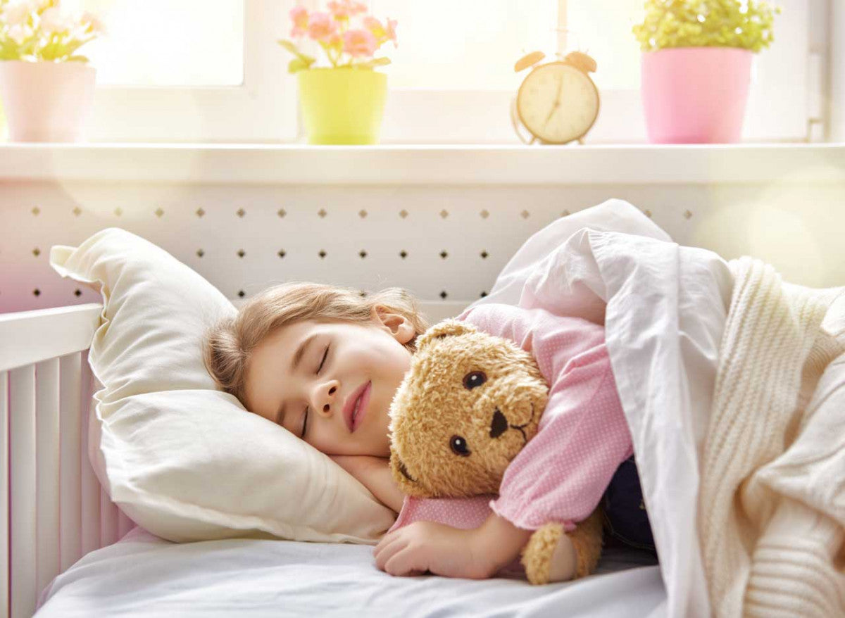 girl with her teddy bear